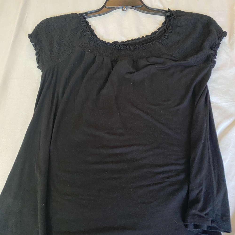Black blouse. Scrunchy shoulders.